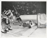 Stan Mikita celebrates a score on Jacques Plante original 1960 photo