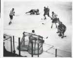 Jacques Plante surrounded by Hawks and Canadiens with Pilote original 1962 photo