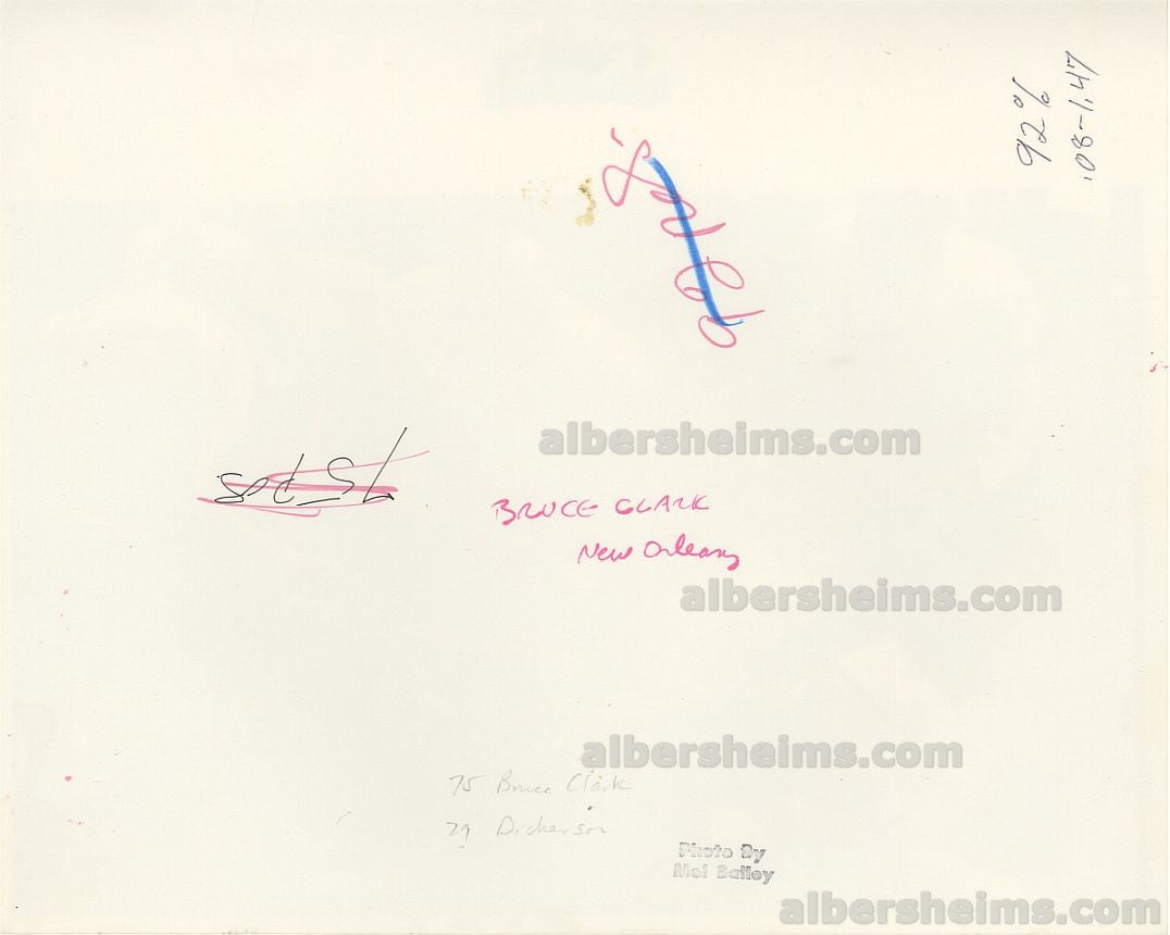 Eric Dickerson Rookie Era Taken down by Bruce Clark New Orleans Saints TYPE I original photo