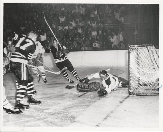 Stan Mikita celebrates a score on Jacques Plante original 1960 photo