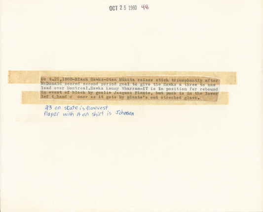 Stan Mikita celebrates a score on Jacques Plante original 1960 photo