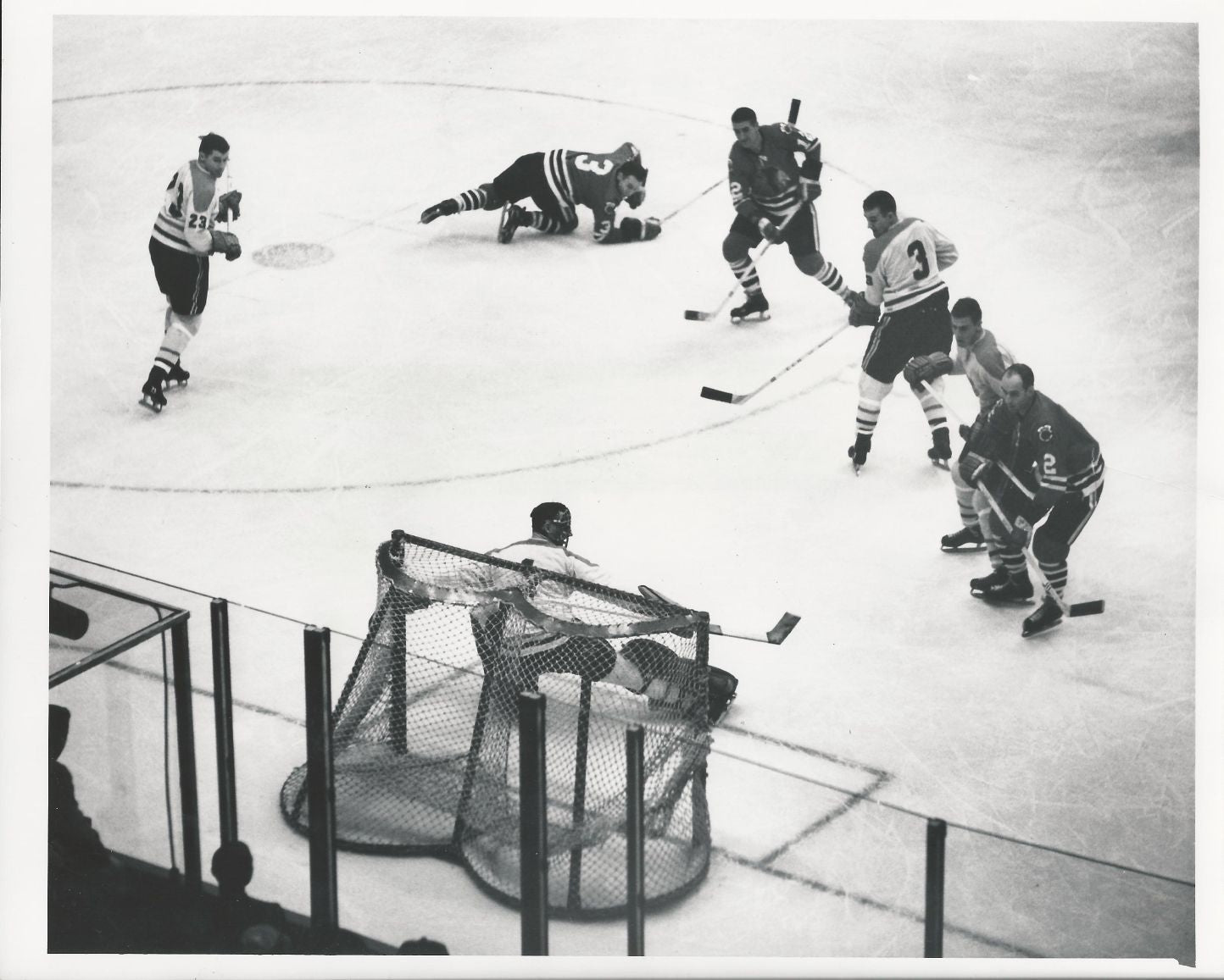 Jacques Plante surrounded by Hawks and Canadiens with Pilote original 1962 photo